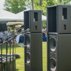 Professional sound system setup for flawless audio at an outdoor event. Essential for successful outdoor event planning.